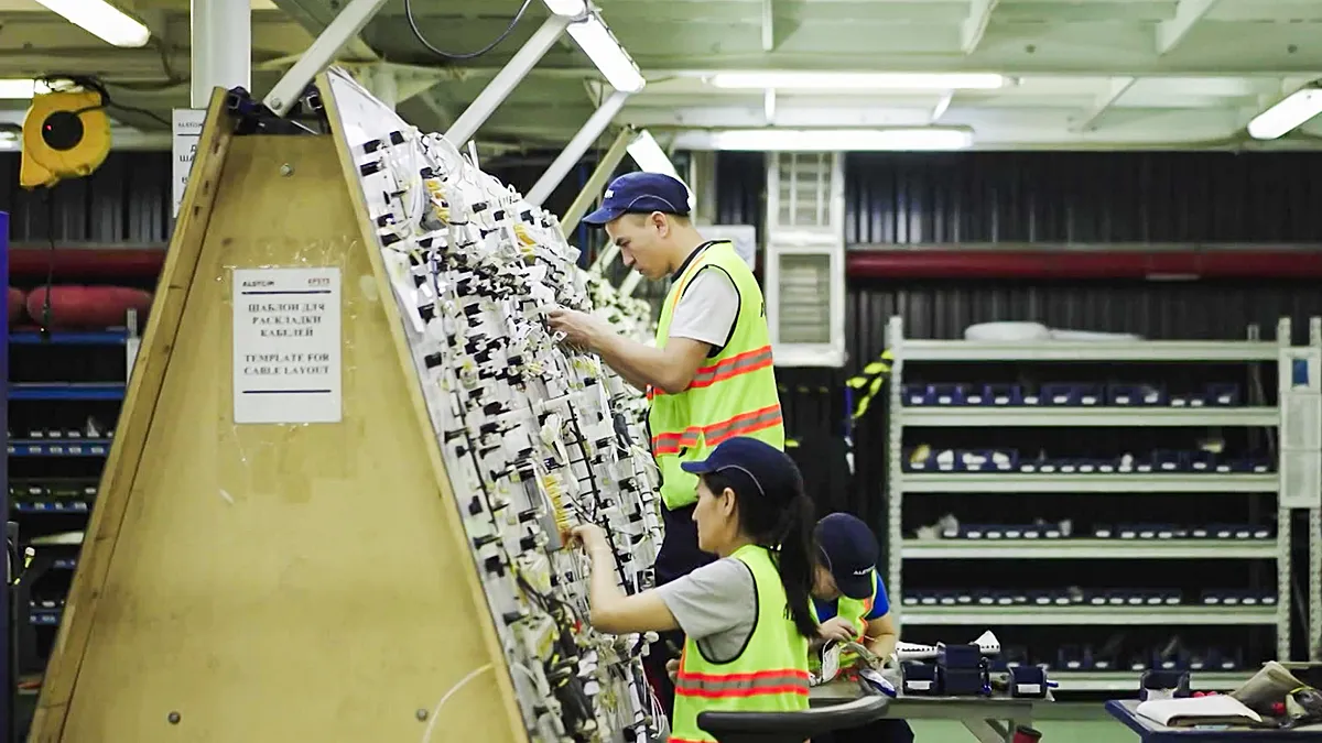 How is this country attracting manufacturing investment?