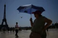 Eiffel Tower and other Paris landmarks to close early as another heatwave sweeps France