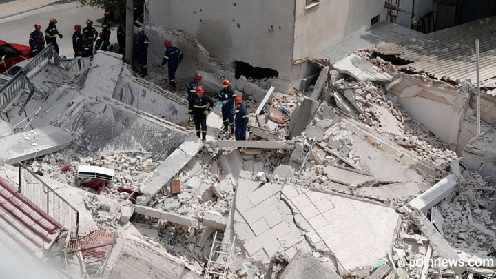 At least four trapped after apartment block collapses in Athens, fire brigade says