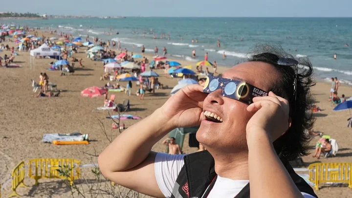 Live. Eye on the sky: Millions across Europe hope to catch a glimpse of rare total eclipse