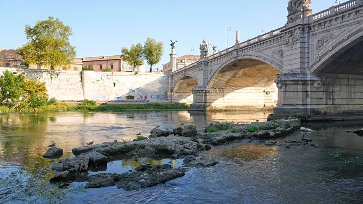 Drought exposes remains of ancient Roman bridge in the Tiber river in Rome
