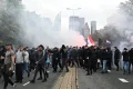 Dutch police clash with hundreds of far-right protesters at anti-immigration rally