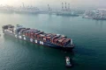 Dozens reported killed after international cargo ship docked in China catches fire